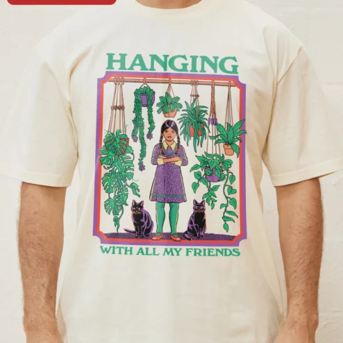Customer in Chicago, Illinois wearing Hanging With All My Friends Wednesday Addams Graphic Tee Retro Goth Plant Mom Shirt