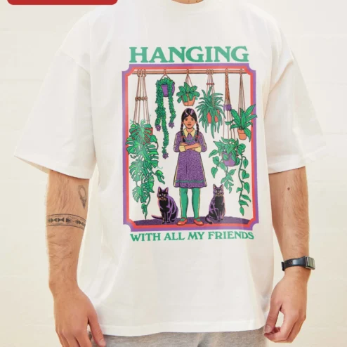 Hanging With All My Friends Wednesday Addams Graphic Tee Retro Spooky Cute Shirt for Women on a hanger, ready to ship from Chicago, Illinois