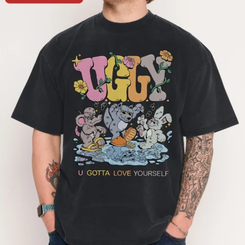 Happy U Gotta Love Yourself Self Love Graphic Tee Cute Cartoon Animal Vintage Wash Shirt on a hanger, ready to ship from Chicago, Illinois