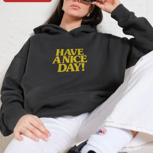 Customer in Chicago, Illinois wearing Have A Nice Day! Hoodie Retro Yellow Smiley Face Positive Message Sweatshirt for Women Men