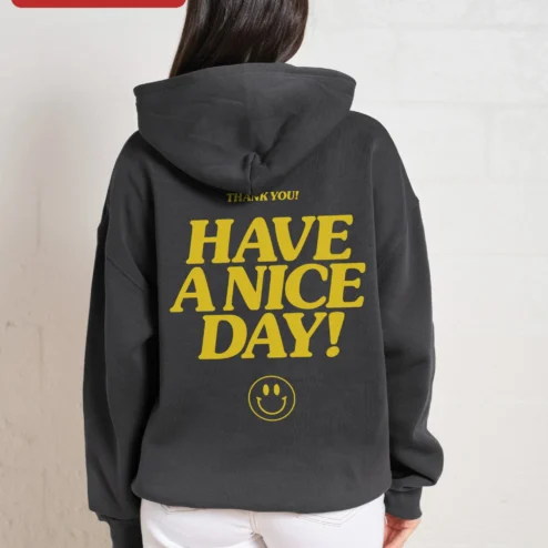 Close-up of Have A Nice Day! Hoodie Retro Yellow Smiley Face Positive Message Sweatshirt for Women Men for streetwear fans in Chicago, Illinois