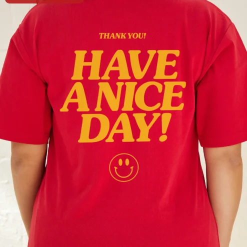 Customer in Chicago, Illinois wearing Have A Nice Day! Retro Typography Ringer Tee for Men