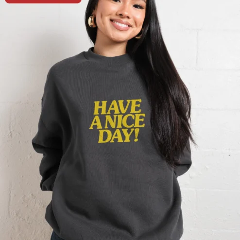 Customer in Chicago, Illinois wearing Have A Nice Day! Sweatshirt Positive Vibes Retro Crewneck Gift for Women