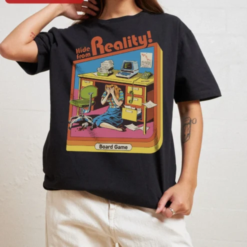 Hide from Reality Board Game Tee Retro Comic Office Humor Shirt for Gamers on a hanger, ready to ship from Chicago, Illinois