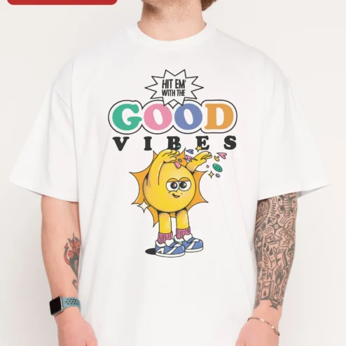 Hit Em With The Good Vibes Tee Retro Cartoon Sun Graphic Shirt Positive Energy Oversized Cotton Top on a hanger, ready to ship from Chicago, Illinois