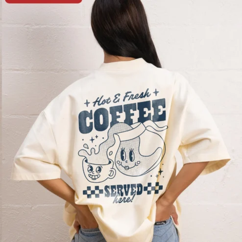 Customer in Chicago, Illinois wearing Hot Fresh COFFEE Retro Cartoon Graphic Tee for Coffee Lovers and Baristas