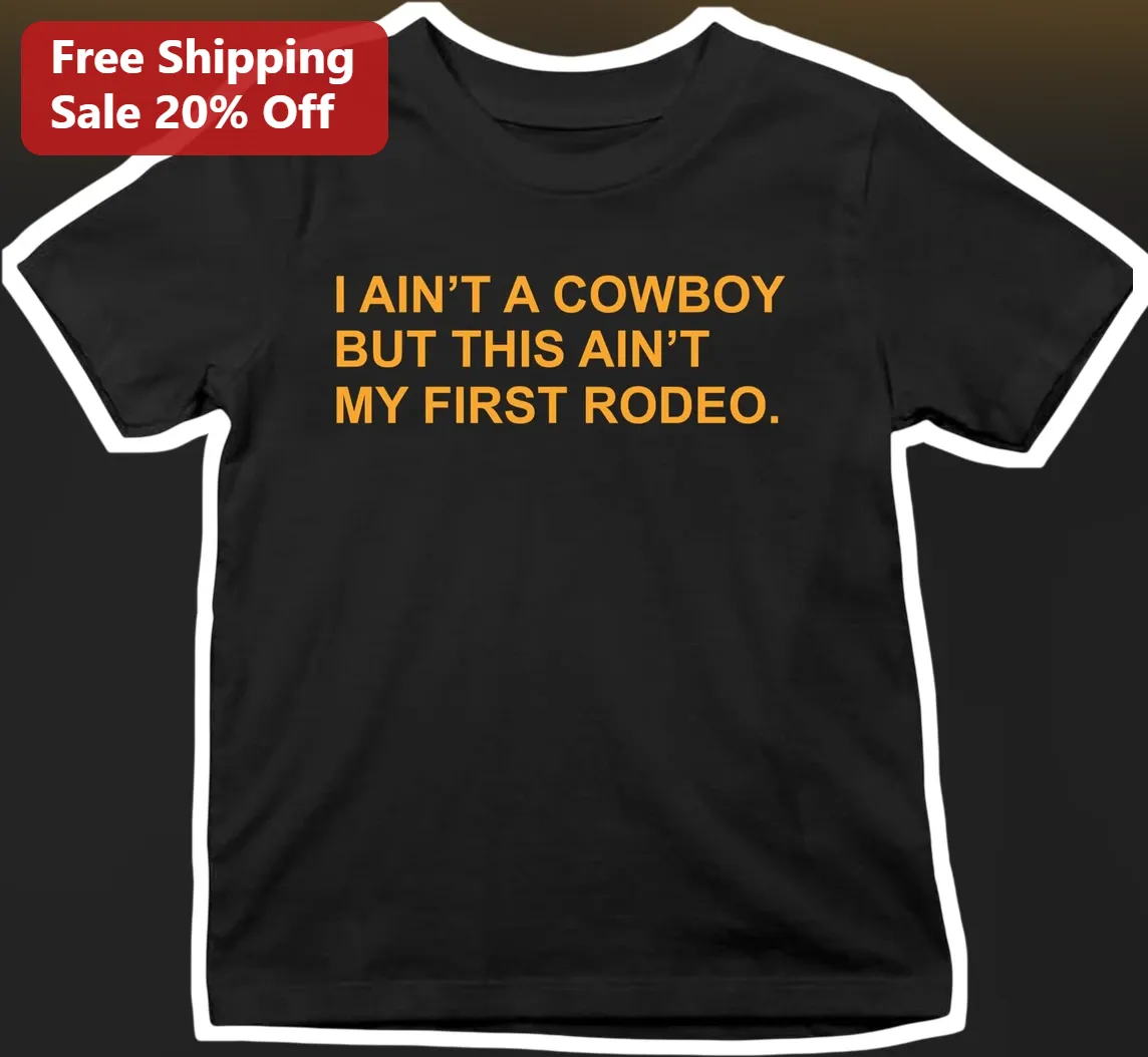 I Ain't A Cowboy But This Ain't My First Rodeo Graphic Tee Country Humor Shirt