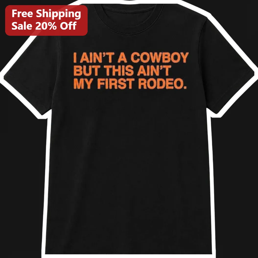 I Ain't A Cowboy But This Ain't My First Rodeo Graphic Tee Western Humor Shirt for Country Music Fans
