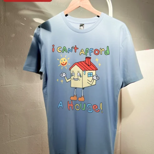 Customer in Chicago, Illinois wearing I Can't Afford A House Graphic Tee Funny Millennial Housing Crisis Shirt Gift