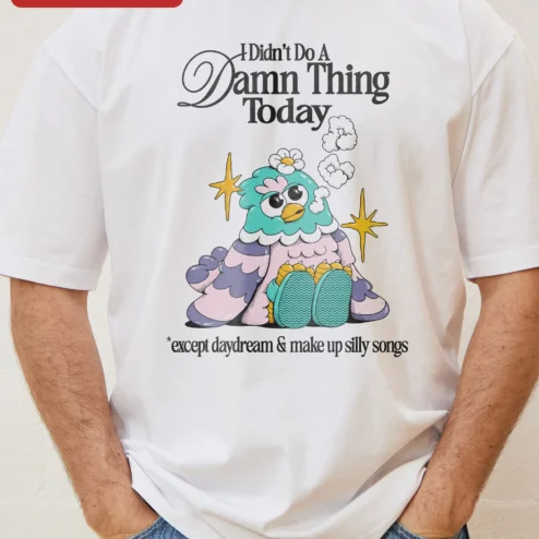 I Didn't Do A Damn Thing Today Except Daydream And Make Up Silly Songs Funny Introvert Tee on a hanger, ready to ship from Chicago, Illinois