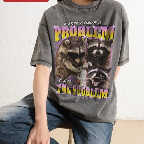 I Don't Have A Problem I Am The Problem Funny Raccoon Acid Wash Tee on a hanger, ready to ship from Chicago, Illinois