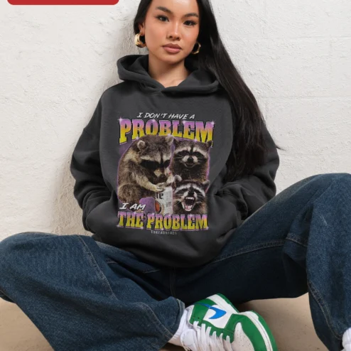 I Don't Have A Problem I Am The Problem Funny Raccoon Hoodie on a hanger, ready to ship from Chicago, Illinois