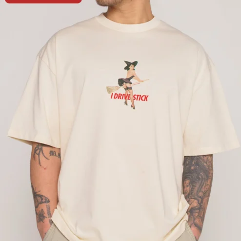 Customer in Chicago, Illinois wearing I Drive Stick Tee Vintage Pin Up Witch Halloween Manual Transmission Shirt