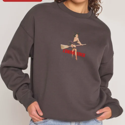 I Drive Stick Witch Broomstick Sweatshirt Retro Pin Up Halloween Fall Gift on a hanger, ready to ship from Chicago, Illinois