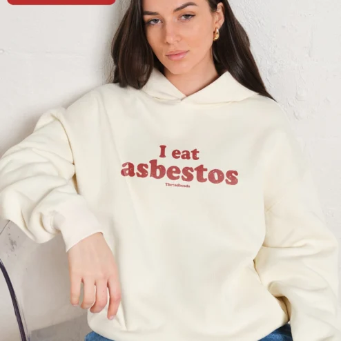 I Eat Asbestos Hoodie Dark Humor Pullover Sweatshirt Men's Edgy Streetwear Gift on a hanger, ready to ship from Chicago, Illinois