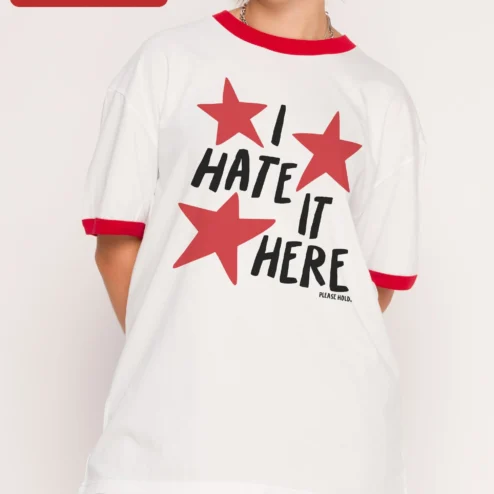 Customer in Chicago, Illinois wearing I Hate It Here Tee Funny Sarcastic Introvert Meme Shirt Unofficial Fan Gift