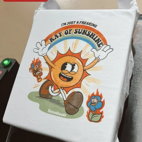 Close-up of I'M JUST A FREAKING RAY OF SUNSHINE Vintage Cartoon Sun Graphic Tee Funny Sarcastic Quote Shirt Gift for streetwear fans in Chicago, Illinois