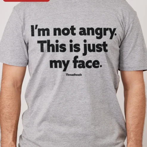 I'm Not Angry This Is Just My Face Tee Funny Sarcastic Humor Graphic T-Shirt Gift for Men Women on a hanger, ready to ship from Chicago, Illinois