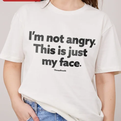 Customer in Chicago, Illinois wearing I'm Not Angry This Is Just My Face Tee Funny Sarcastic Humor Graphic T-Shirt Gift for Men Women