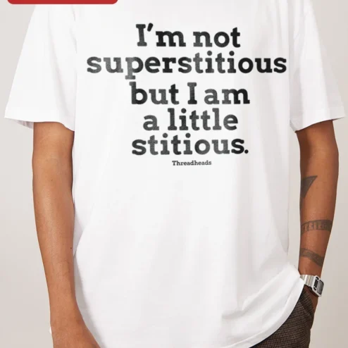 I'm Not Superstitious But I Am A Little Stitious Michael Scott Quote Tee The Office Fan Gift on a hanger, ready to ship from Chicago, Illinois