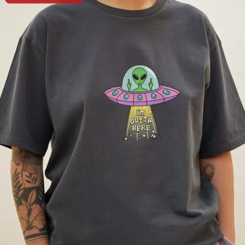 I'm Outta Here Alien UFO Graphic Tee Funny Sci-Fi Humor Shirt Gift for Introverts on a hanger, ready to ship from Chicago, Illinois