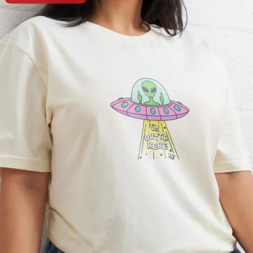Customer in Chicago, Illinois wearing I'm Outta Here Alien UFO Graphic Tee Funny Sci-Fi Humor Shirt Gift for Introverts