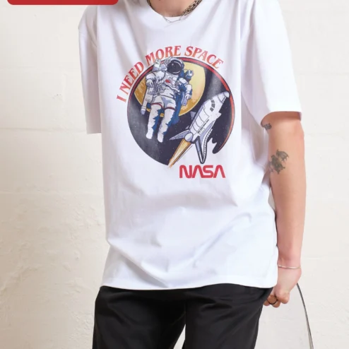 Customer in Chicago, Illinois wearing I Need More Space NASA Graphic Tee Funny Space Pun Shirt for Astronomy Lovers
