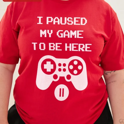 Close-up of I Paused My Game To Be Here Funny Gamer Tee Gift for Men Women for streetwear fans in Chicago, Illinois