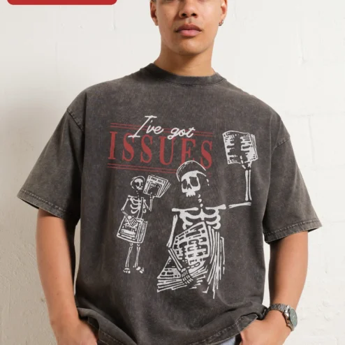 I've Got Issues Tee Skeleton Newspaper Graphic Acid Wash Vintage Grunge Shirt on a hanger, ready to ship from Chicago, Illinois