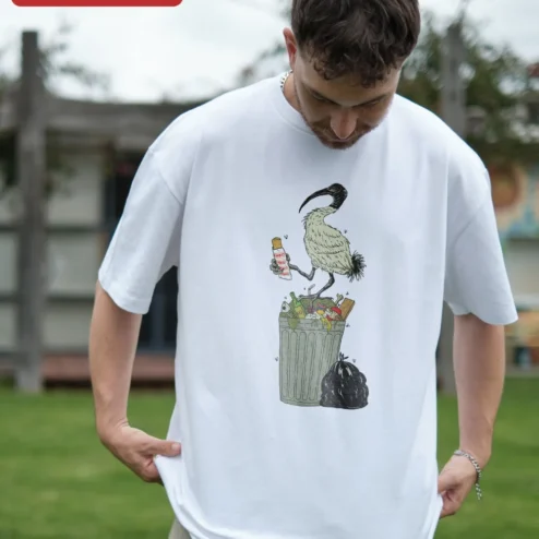 Close-up of Ibis Eating Trash Funny Animal Illustration Tee Bin Chicken Meme Shirt for Bird Lovers for streetwear fans in Chicago, Illinois