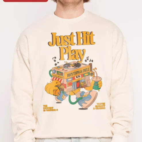 Just Hit Play Rhythm Deli The Moment Is Waiting You're Already A Classic Retro Music Crewneck Sweats on a hanger, ready to ship from Chicago, Illinois
