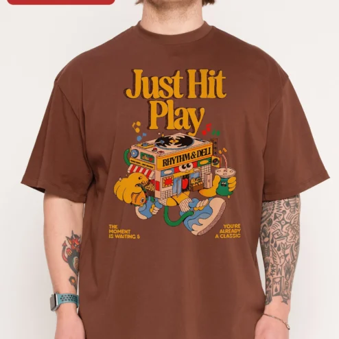 Just Hit Play Rhythm Deli Vintage Boombox Graphic Tee Music Lover Gift on a hanger, ready to ship from Chicago, Illinois