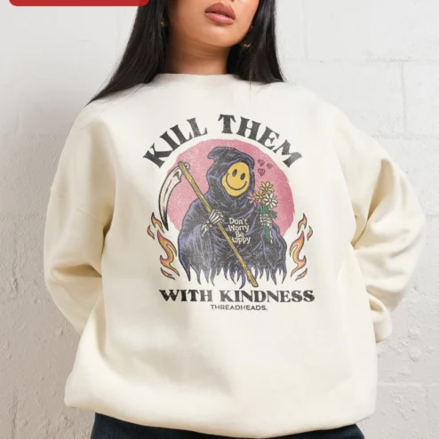 Close-up of Kill Them With Kindness Don't Worry Be Happy Grim Reaper Smiley Face Sweatshirt for streetwear fans in Chicago, Illinois