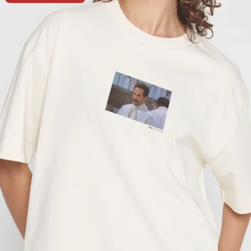 Larry David Chef Outfit Graphic Tee Curb Your Enthusiasm Comedy Shirt on a hanger, ready to ship from Chicago, Illinois