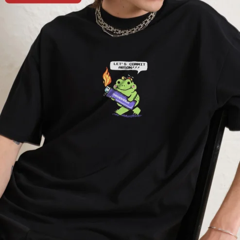Let's Commit Arson Frog Graphic Tee Dark Humor Meme Shirt Unisex Oversized Fit on a hanger, ready to ship from Chicago, Illinois