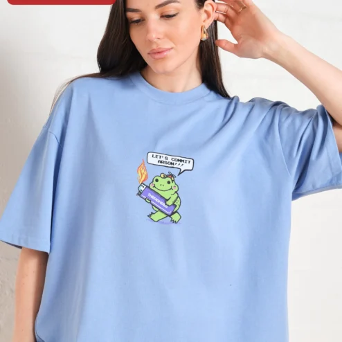 Customer in Chicago, Illinois wearing Let's Commit Arson Frog Graphic Tee Dark Humor Meme Shirt Unisex Oversized Fit