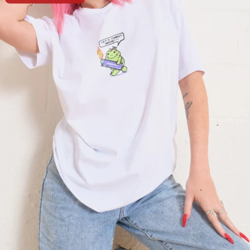 Close-up of Let's Commit Arson Funny Frog Graphic Tee Unisex Dark Humor Kawaii Shirt for streetwear fans in Chicago, Illinois