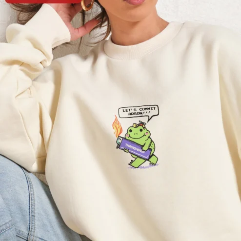 Close-up of Let's Commit Arson Sweatshirt Dark Humor Frog Crewneck Unisex Streetwear Gift for streetwear fans in Chicago, Illinois