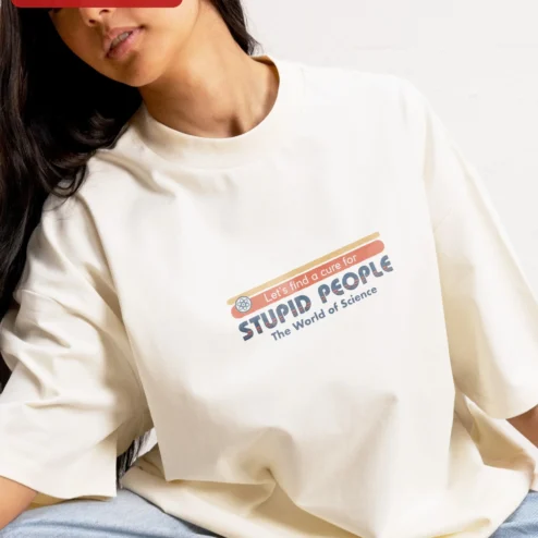 Close-up of Let's Find a Cure for Stupid People Science Humor Tee Sarcastic Nerd Gift for streetwear fans in Chicago, Illinois