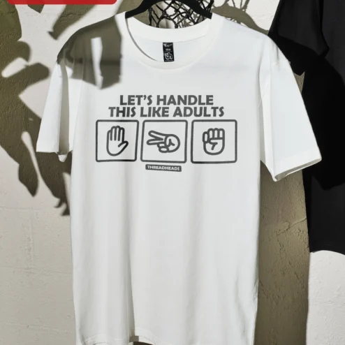 Customer in Chicago, Illinois wearing Let's Handle This Like Adults Funny Rock Paper Scissors Graphic Tee Gift for Men Women