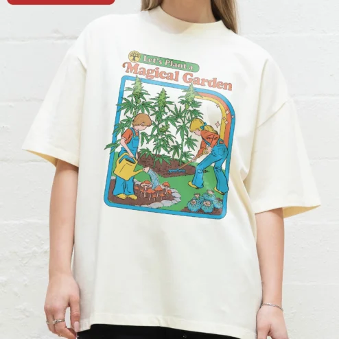 Let's Plant a Magical Garden Tee Retro Cannabis Gardening Shirt for Plant Lovers on a hanger, ready to ship from Chicago, Illinois