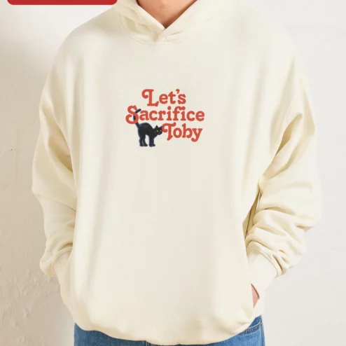Let's Sacrifice Toby Hoodie Steven Rhodes Retro Occult Graphic Pullover Funny Cat Gift on a hanger, ready to ship from Chicago, Illinois