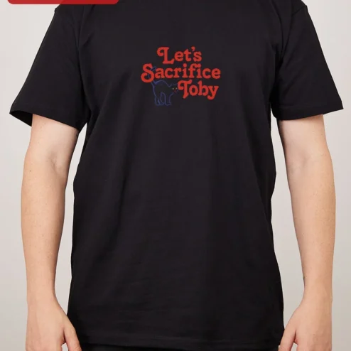 Customer in Chicago, Illinois wearing Let's Sacrifice Toby Tee Funny Black Cat Retro Ringer Shirt Gift for Men Women