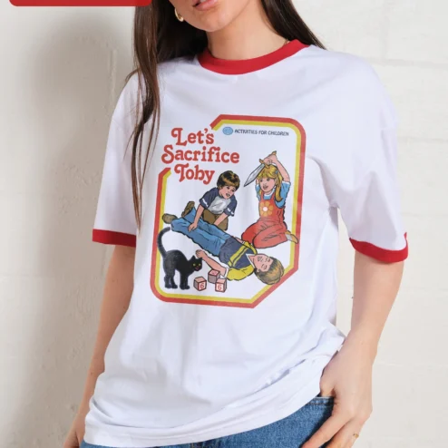 Customer in Chicago, Illinois wearing Let's Sacrifice Toby Tee Steven Rhodes Retro Dark Humor Graphic T-Shirt Unisex Cotton Gift