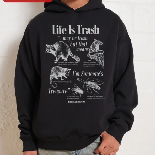 Life Is Trash I May Be Trash But That Means Im Someone's Treasure Hoodie on a hanger, ready to ship from Chicago, Illinois