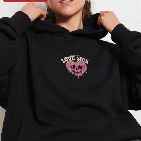 Close-up of Love Sick Hoodie Melting Skull Heart Vintage Gothic Streetwear Unisex Graphic Pullover for streetwear fans in Chicago, Illinois