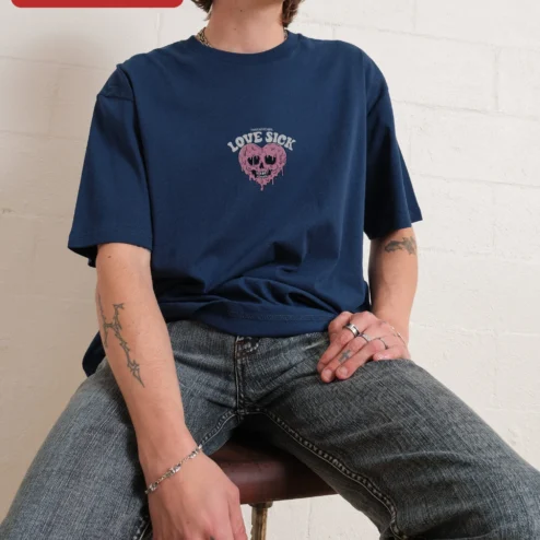 Customer in Chicago, Illinois wearing Love Sick Tee Melting Skull Heart Graphic Ringer Shirt Alternative Grunge Y2K Streetwear