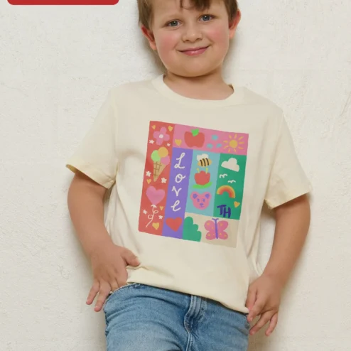LOVE TH Tee Colorful Patchwork Icons Graphic T-Shirt for Teachers and Kids on a hanger, ready to ship from Chicago, Illinois