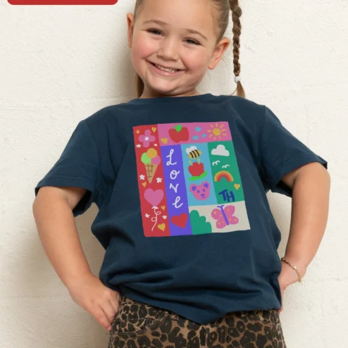 Customer in Chicago, Illinois wearing LOVE TH Tee Colorful Patchwork Icons Graphic T-Shirt for Teachers and Kids