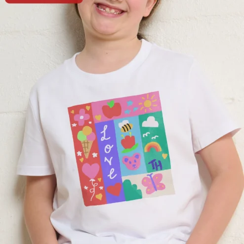 Close-up of LOVE TH Tee Colorful Patchwork Icons Graphic T-Shirt for Teachers and Kids for streetwear fans in Chicago, Illinois